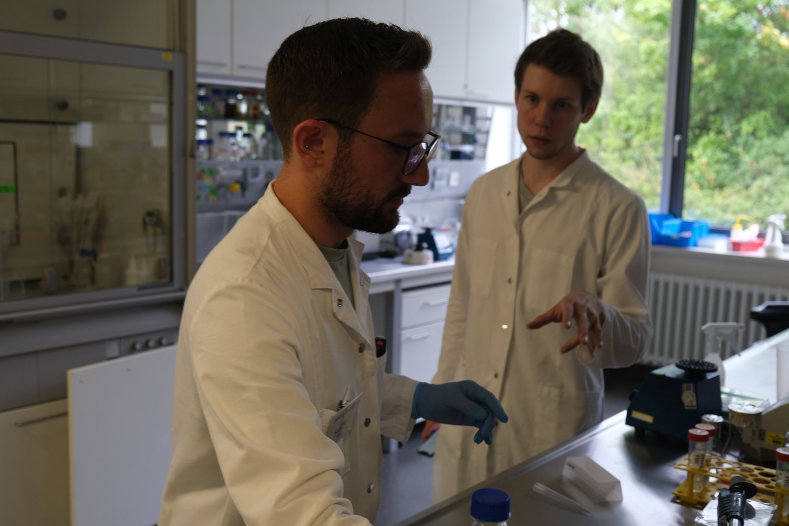 Patrick and colleague in the lab